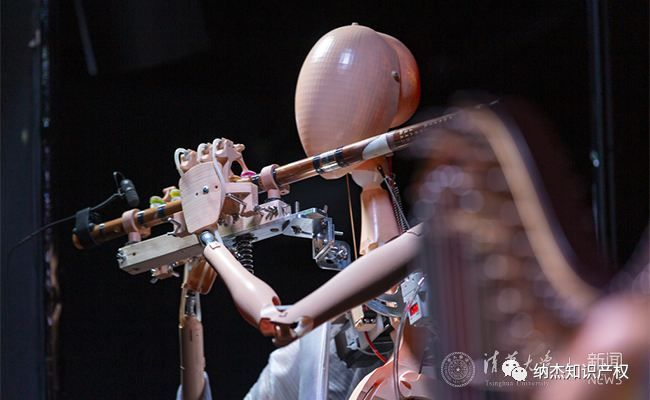 清华大学研制的墨甲机器人乐队 清华大学研制的墨甲机器人乐队
